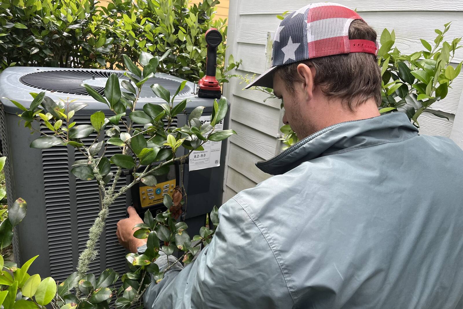 Heat pump outdoor unit running in heat mode on a cold Northeast Florida morning