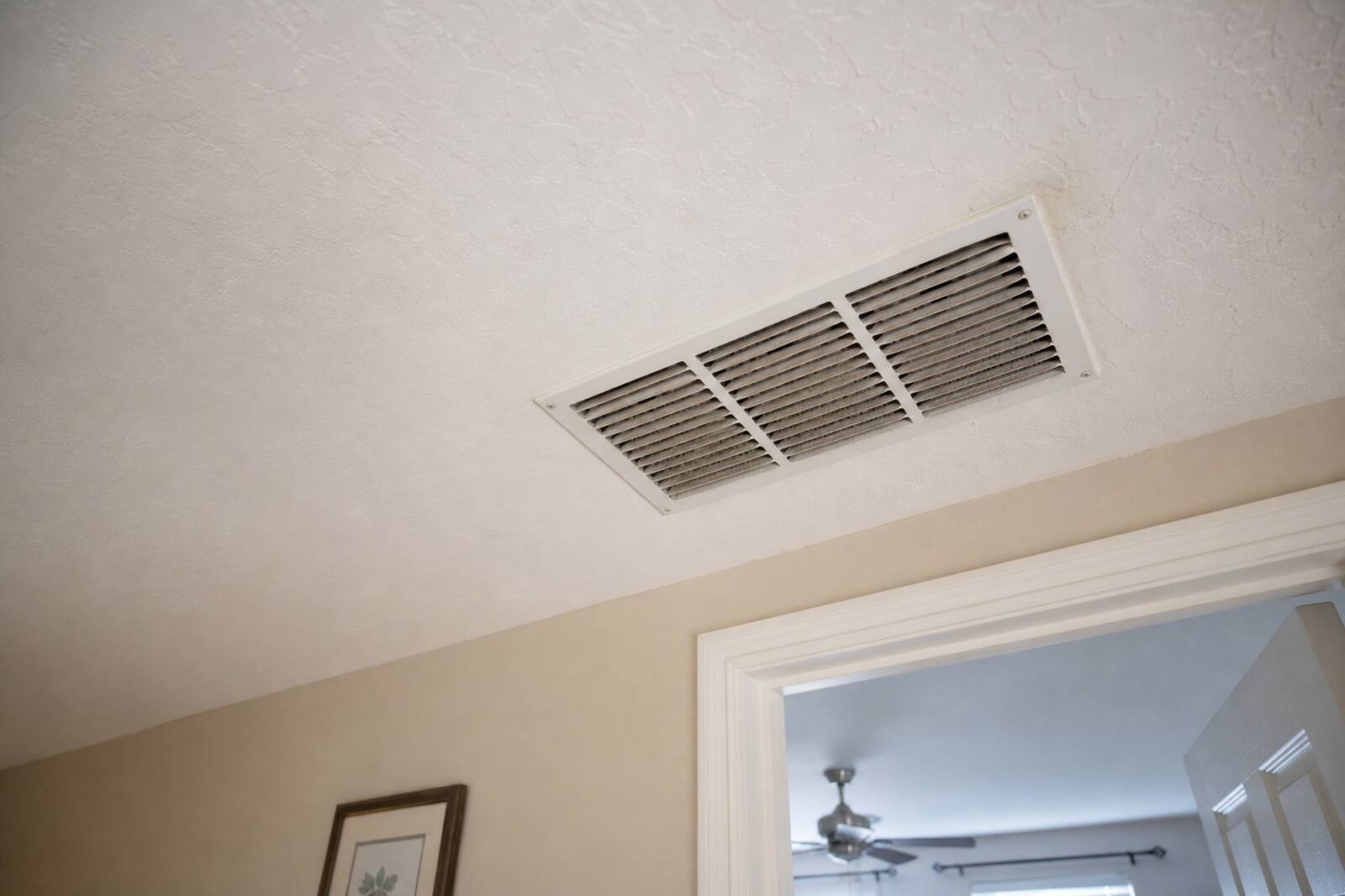 Condensate drain line and pan on an indoor air handler in a Jacksonville home