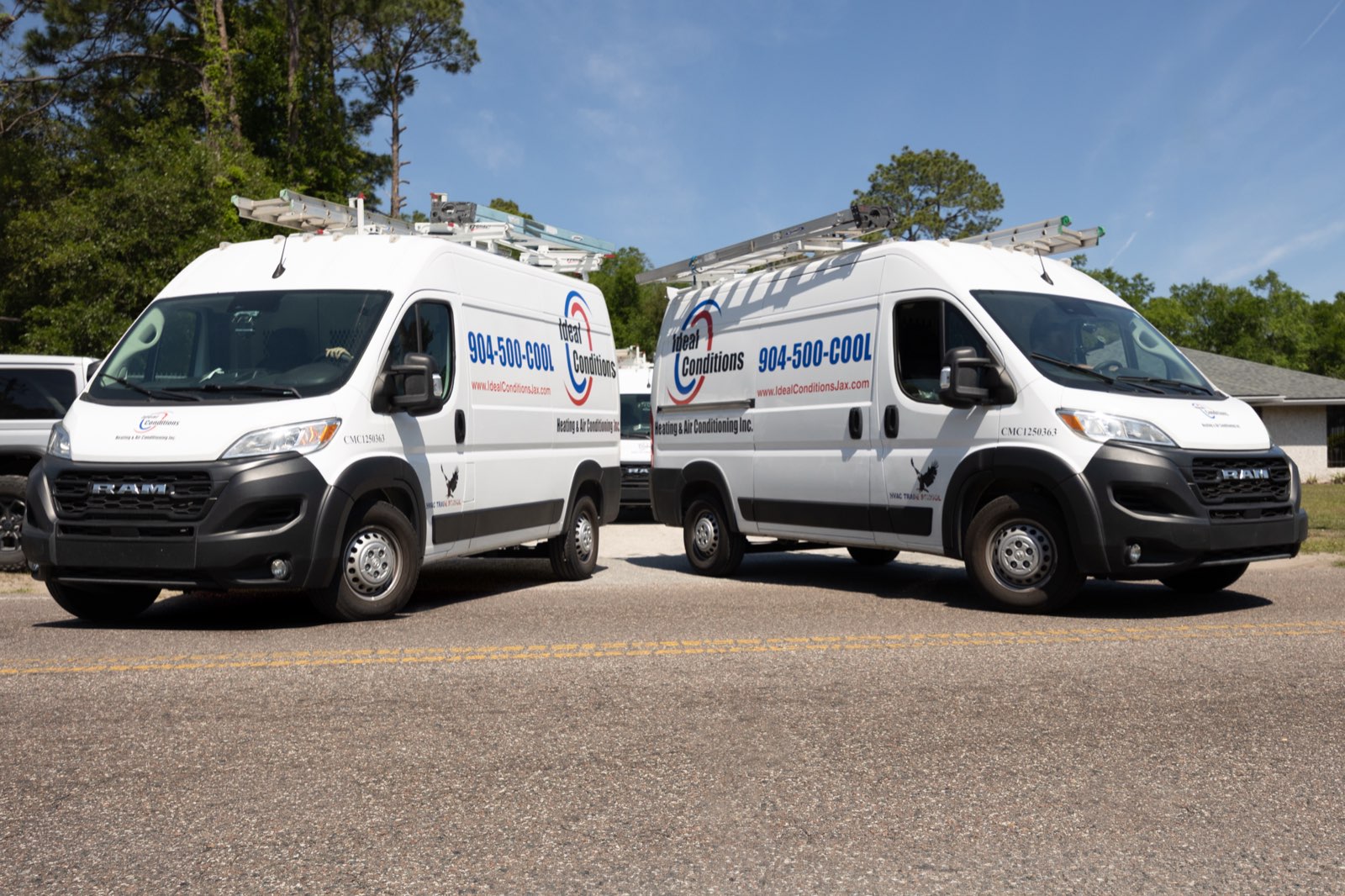 Ideal Conditions branded service vans in Jacksonville, FL