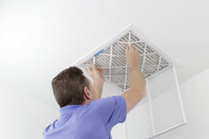 Removing a square pleated dirty air filter